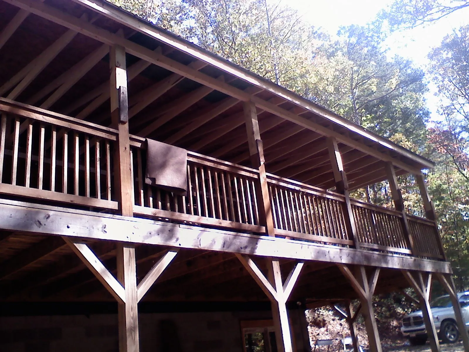 Timber framing under a new elevated porch and deck — Roof Leak Repair in Bee Spring by Roofing Brothers
